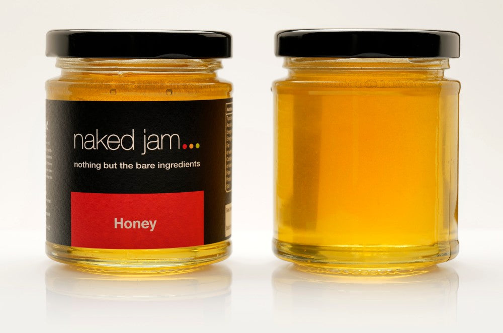 Fresh, organic, New Forest honey - Bursting with nature's perfect sweetness by Naked Jam. 
